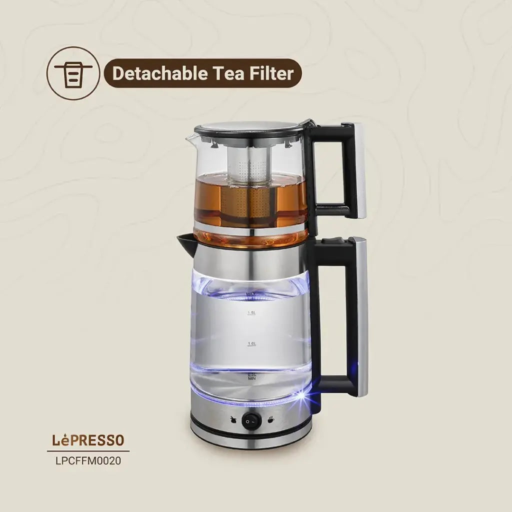 Glass teapot with detachable tea filter on a beige background, featuring the LePresso brand.