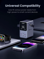 Power bank with smartphone, watch, and laptop on a dark background