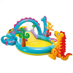 Colorful inflatable playground with dinosaur design on a white background