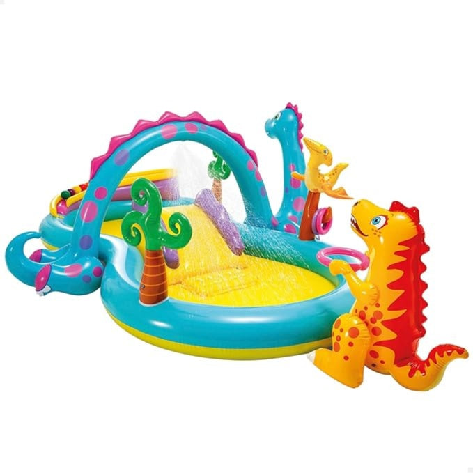 Colorful inflatable playground with dinosaur design on a white background