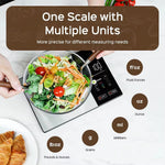 Modern black glass smart kitchen scale with Tare function for measuring net weight.
