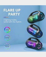 Dual Tronsmart Bang SE speakers paired for stereo sound outdoors.
