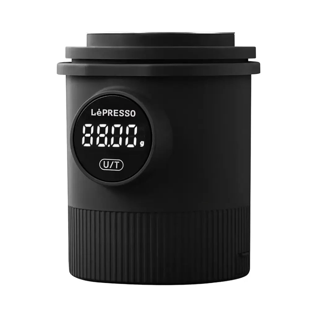 Black Le'Presso coffee pod with digital display on a white background