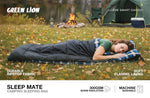 Person sleeping in a camping sleeping bag with a campfire and tent in the background, featuring Green Lion brand.