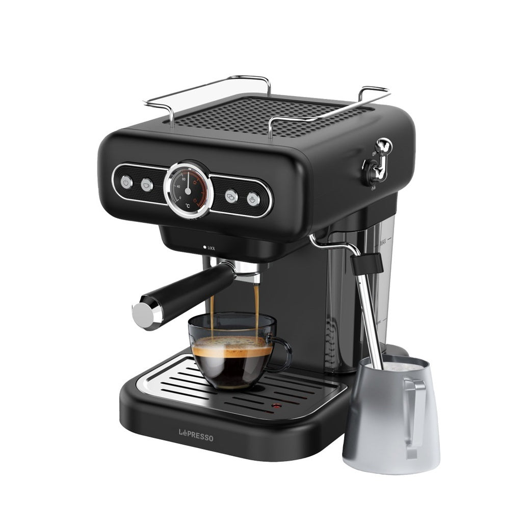 Retro espresso machine with boiler gauge and milk steamer.