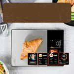 Modern black glass smart kitchen scale with Tare function for measuring net weight.