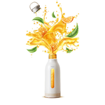 White water bottle with gold accents and orange juice splashes on a white background
