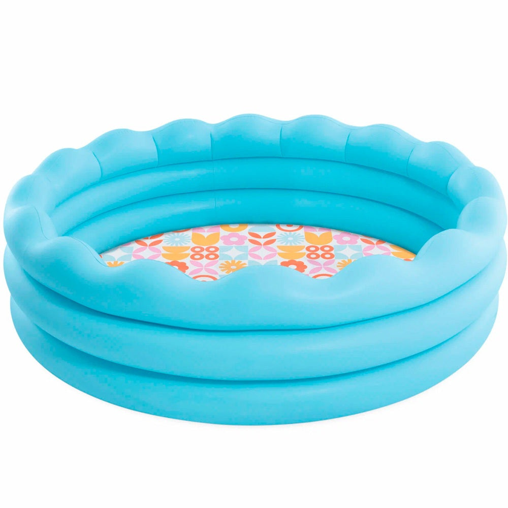 Inflatable children's pool with floral patterned interior on a white background