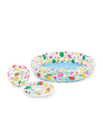 Inflatable pool with colorful fruit and flamingo pattern on a white background
