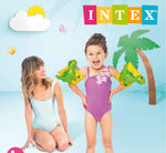 Woman and child with inflatable crocodile arm bands on a blue background with Intex logo.