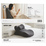 Green Lion Relief Wedge Pillow packaging with a woman using a smartphone in the background.