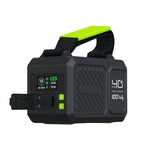 Black and green battery pack with digital display on a white background