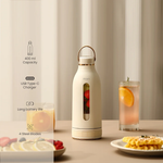 White water bottle with USB charging feature on a table with food items